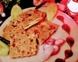 A picture of step 12 of Egg paratha.