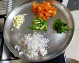 A picture of step 1 of Masala Rice.