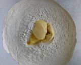 A picture of step 2 of #MyKenyanTraditionalDish Pumpkin/cinnamon chapatis.