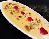 A picture of step 12 of Mango Rabdi With Chocolate Dry Fruit Roll.