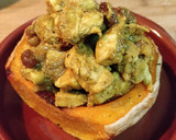 Foto del paso 4 de la receta: Calabaza rellena de pollo con pasas