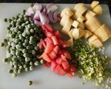 A picture of step 1 of Instant masala rice with curd & papad.