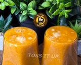 A picture of step 2 of Orange Carrot Drink.