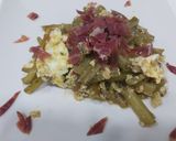 Foto del paso 3 de la receta: Revuelto de tagarnina en pimentón, con tiritas de jamón