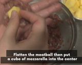 A picture of step 4 of Gooey Cheese-Stuffed Meatballs | Fully Tummies.