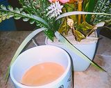 A picture of step 3 of Karak doodh pati.