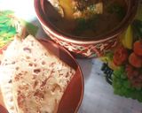 A picture of step 7 of Aloo gosht with roti.