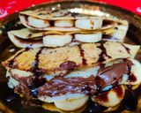 A picture of step 5 of Dosa with Chocolatey Nutella and ripe banana filling.