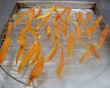 Foto del paso 7 de la receta: Cáscaras de naranja confitadas caseras