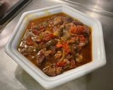 Une image de l'étape 24 de Porc confit aux figues, poivrons et tomates.