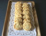 Foto del passaggio 8 della ricetta Biscotti con arance candite e nocciole