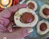 A picture of step 8 of Mini Gulab Jamun Cake in Appe Pan.