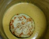 A picture of step 3 of Brinjal Disc Fritters or Begun bhaja.