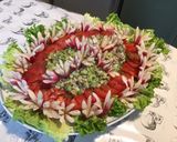 Une image de l'étape 11 de Salade de tomates,scarole,céleri et thon aux radis « fleurs ».