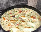 Foto del paso 10 de la receta: Calamares rellenos en salsa de mariscos a la crema