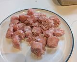 A picture of step 1 of Pasta alla vodka, with pork and sprouts.