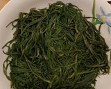 A picture of step 1 of Poached Egg on a Bed of Agretti.
