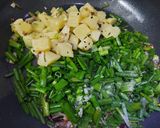 A picture of step 3 of Potatoes with Green Onion.