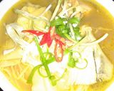 Hình bước làm 6 của món Canh măng chua đầu cá hồi