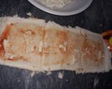 A picture of step 2 of Pin wheel sandwiches.