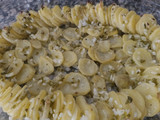 Papas con queso y huevo al horno
