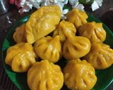 आंब्याच्या रसातील मोदक (ambyachya rasatil modak recipe in marathi) रेसिपी स्टेप 10 फोटो 