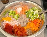 A picture of step 3 of Lobia chilla loaded with veggies.