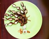 A picture of step 5 of Dryfruits sweet in Peacock pattern.