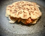 Foto del paso 11 de la receta: Quesadillas de jamón ibérico, tinga de pollo y setas con pico de gallo
