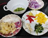 A picture of step 1 of Corn daliya upma.