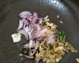 A picture of step 5 of Nutty lemony cabbage roll in green sauce.