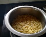 A picture of step 1 of Noodle Burger with Aloo Tikki.