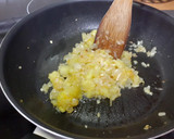 Foto del paso 6 de la receta: Calabacín relleno con cebolla y mijo