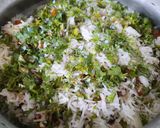 A picture of step 13 of Kashmiri Pulao.