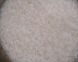 A picture of step 1 of Custard Flavoured Roasted Ground Rice Phirni.
