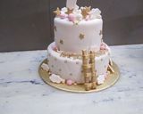 A picture of step 9 of Up in the clouds fondant Birthday cake.