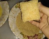 A picture of step 12 of Bihari Parcels with cheesy blast.