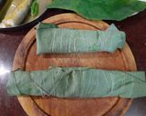 A picture of step 4 of Pabda Paturi (with Taro/ kochu/Alvi leaves) and Pabda Bhappa.