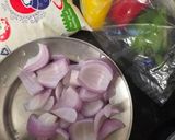 A picture of step 1 of Dahi Capsicum.