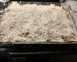 A picture of step 8 of Chicken Enchiladas (white sauce).