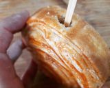 Foto del paso 14 de la receta Espiral de hojaldre relleno de crema de melocotón y chocolate