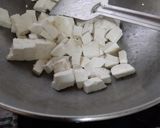 A picture of step 3 of Ghee roasted paneer masala.