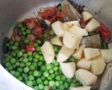 A picture of step 4 of Green peas and potato pulao.