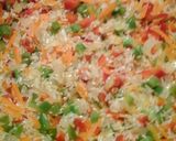 Foto del paso 3 de la receta: Tomates rellenos con arroz, pollo y verduras
