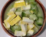 Foto langkah ke 5 dari resep Sayur Oyong Tahu Santan.