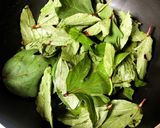 A picture of step 1 of Gongura Prawns (Andhra style Prawns Curry cooked with tangy Sorrel Leaves).