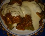 Foto del paso 9 de la receta: Niños envueltos, con salsa roja y salsa blanca
