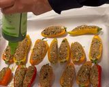 A picture of step 6 of Stuffed baby peppers with date couscous and feta.