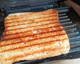A picture of step 3 of Cheese spread salad grilled sandwich.