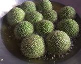 Foto langkah ke 13 dari resep Onde onde kopong isi kacang hijau coklat.